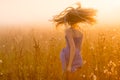 Dancing beautiful girl in fog Royalty Free Stock Photo