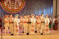 Dancing children in traditional costumes