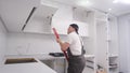 Dancing construction worker during house renovation