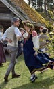 Dancing couple in the Latvian national costume