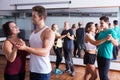 Dancing couples learning salsa Royalty Free Stock Photo