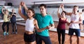 Dancing couples learning salsa Royalty Free Stock Photo