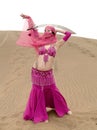 Dancing at desert with sabre Royalty Free Stock Photo