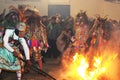 Dancing with fire and masks in the procession of the vigen del carmen in the streets at night june 2018 paucartambo cuzco