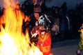 Dancing with fire and masks in the procession of the vigen del carmen in the streets at night june 2018 paucartambo cuzco Royalty Free Stock Photo