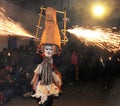 dancing devotees with fireworks and masks in the procession of la vigen del carmen in the streets at night june 2018 paucartambo