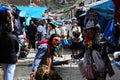 Dancing devotees with mask in the streets of the town the procession of the Virgin of Carmen -.Catholic religion