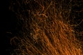 Dancing flames and sparks isolated on black Royalty Free Stock Photo