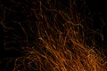 Dancing flames and sparks isolated on black Royalty Free Stock Photo