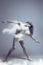 Muscle man dancer in dust / fog Royalty Free Stock Photo