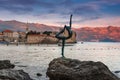 Dancing Girl Statue at sunset. Montenegro. Adriatic sea.