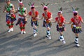 Taiwanese dancing group in garb of Amis Tribe from Hualien with headdress and skirt, Kaohsiung, Taiwan