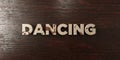 Dancing - grungy wooden headline on Maple - 3D rendered royalty free stock image