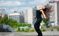 Dancing hip-hop over urban city Royalty Free Stock Photo