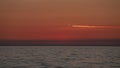 Dancing Horizons. Timelapse Serenity of the Setting Sun Over the Sea