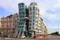 Dancing House in Prague with red tram in front Royalty Free Stock Photo