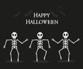 Dancing human skeletons. Happy Halloween. White silhouettes of skeletons on an isolated black background. Vector illustration Royalty Free Stock Photo