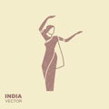 Dancing Indian woman in traditional clothing. Flat icon Royalty Free Stock Photo