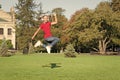 Dancing jump style. Happy dancing girl. Small dancer jumping to music on green grass. Little child enjoy dancing to Royalty Free Stock Photo