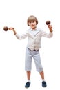 Dancing little boy with maracas