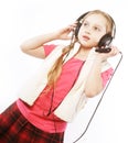 Dancing little girl headphones music Royalty Free Stock Photo