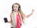 Dancing little girl headphones music singing Royalty Free Stock Photo