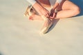 Dancing on pointe. Ballerina shoes. Ballerina legs in white ballet shoes. Lacing ballet slippers. Female feet in pointe Royalty Free Stock Photo