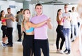 Dancing couples learning salsa at dance class Royalty Free Stock Photo
