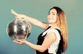 Dancing school. Cheerful woman dancing teacher hold disco ball. Mirrors reflecting lights disco atmosphere. How about