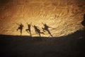 Dancing shadows on the rock in the desert Royalty Free Stock Photo