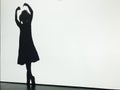 Silhouette of a little girl at ballet lesson