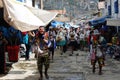 Dancing devotees with mask in the streets of the town the procession of the Virgin of Carmen -.Catholic religion