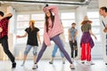 dancing together. group of young dancers performing a common choreography Royalty Free Stock Photo