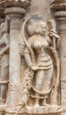 Dancing woman admired by parrot at Shirangam Temple.