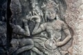 Dancing woman on 12th century ruined relief of the Bayon temple, Cambodia. Historical artwork in Angkor