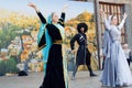 Dancing women of ethnic dancers group from Georgia country making outdoor show