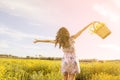 Dancing with yellow daisies in a field warm filter applied Royalty Free Stock Photo