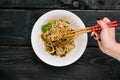 Dandan Noodles on chopsticks