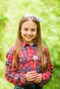 Dandelion is beautiful and full of symbolism. Summer is here. Summer garden flower. Girl cute teen dressed country Royalty Free Stock Photo