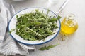 Dandelion salad with dressing