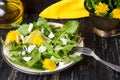 Dandelion salad with onions and cheese