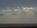 Dandi Beach at dawn - cloudy sky covering sun - Gujarat tourism - India beach holiday - Historical Royalty Free Stock Photo