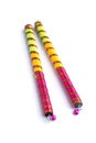 Dandiya sticks on a white background. Raas Garba or Dandiya Raas is the traditional folk dance.