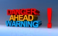 danger ahead warning on blue Royalty Free Stock Photo