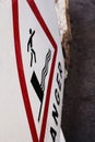 Danger or anger restrictive sign with jumping in water person downward view on sidewalk Royalty Free Stock Photo