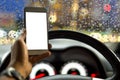 Danger concept man using cell phone while driving in rainy road Royalty Free Stock Photo