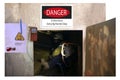 Danger confined space entry by permit only gas tester atmosphere pen and red danger tape placing on permit book