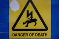 Danger of Death sign with man struck by lightning