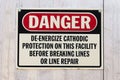 A Danger Deenergize Cathodic Protection at this Facility sign Royalty Free Stock Photo