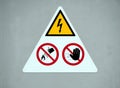 Danger electricity warning sign. don`t touch, don`t throw water Royalty Free Stock Photo